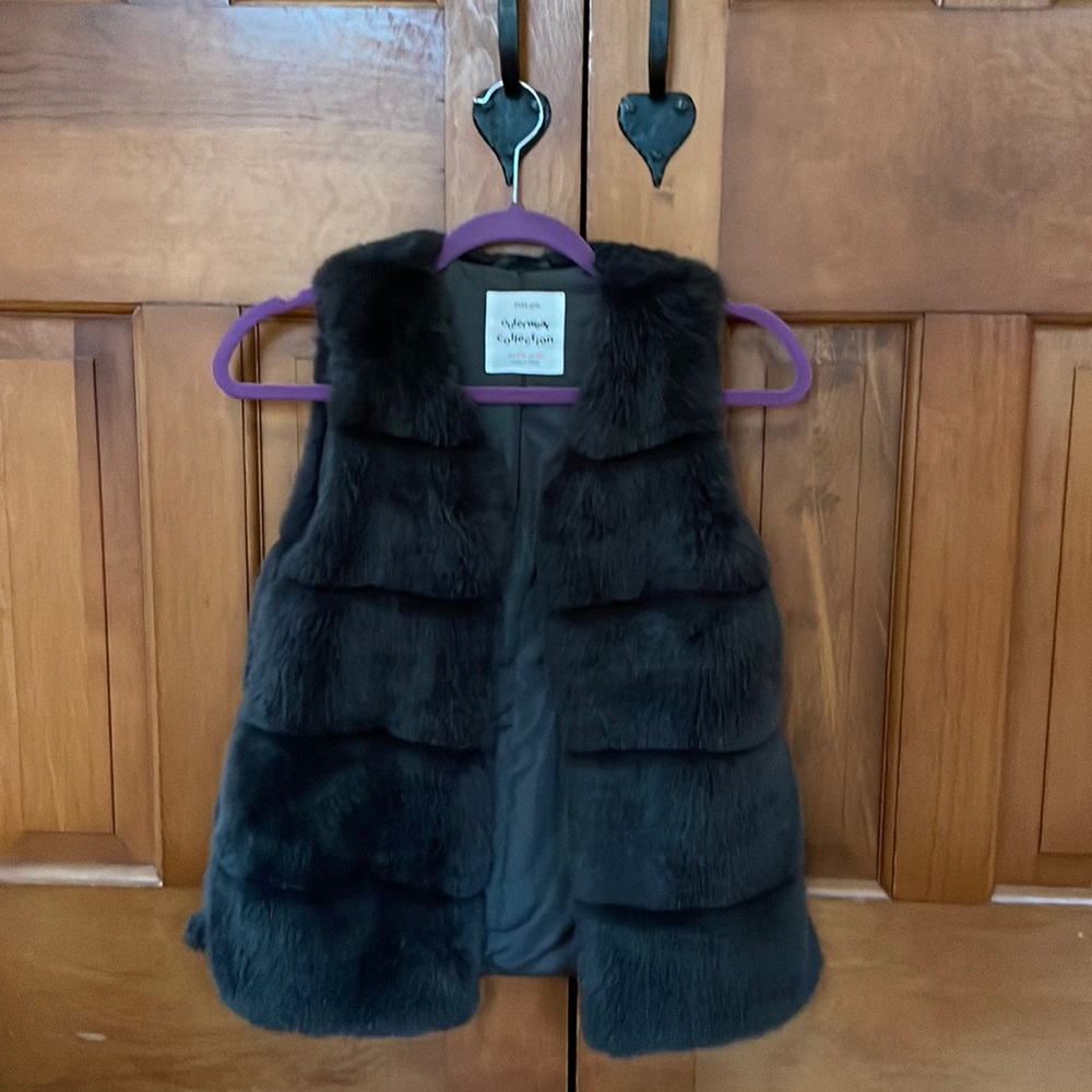 Dark fur vest, very padded and comfortable
